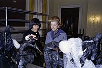 Photograph of First Lady Betty Ford and Social Secretary Maria Downs Looking at Sculptures by Frederic Remington and Charles Russell That Would Be Used as Centerpieces at a State Dinner Honoring President Anwar al(...) - NARA - 7839966