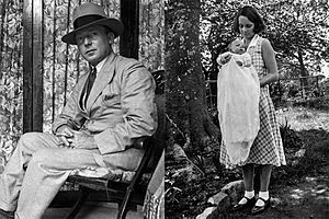 Ruskin Bond's parents- Father Aubrey Alexander Bond and Mother Edith Clarke. Infant Ruskin is nestled in his mother's arms.