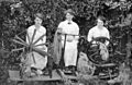 Three women spinning wool to knit socks for soldiers during World War I - Tenterfield, NSW, ca. 1915