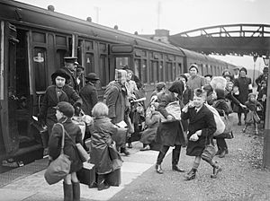 A group of children arrive at Brent station near Kingsbridge, Devon, after being evacuated from Bristol in 1940. D2592