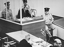 Adolf Eichmann takes notes during his trial USHMM 65268