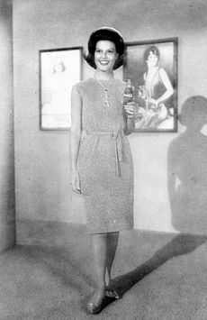 Anita Bryant holding a bottle of Coca-Cola