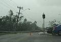 Downed power pole and lines on Hugh Street in Townsville