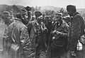 Draža confers with his men