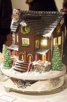 Gingerbread house with steps and trees
