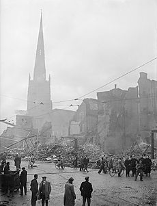 Holy Trinity Church rises above a scene of devastation in Coventry following the Luftwaffe air raid on the night of 14-15 November 1940. H5601