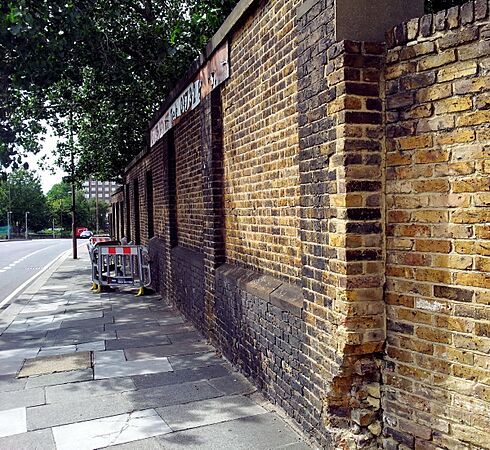 London, Woolwich Dockyard, old factory walls opposite Morris Walk Estate 4