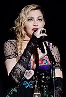 Madonna holding a microphone