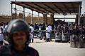 Riot police outside Mubarak courthouse