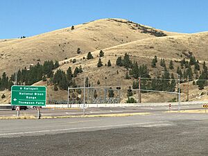 Road sign at junction of US Route 93 and Montana Highway 200 at Ravalli, Montana