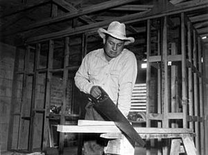 Seminole Indian Bill Osceola building his new home at the Dania Indian Reservation November 1956, by photographer Johnson.jpg