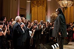 Stevie Wonder receives a standing ovation in the East Room of the White House, 2011