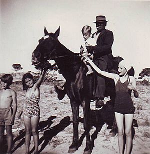 Wandi holding George Atkinson, grandson of the original George Atkinson, 1947