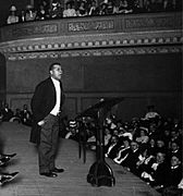 Booker T. Washington delivering his speech