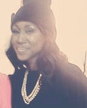 Celebrity Wardrobe Stylist Pilar Scratch dressing Tweet on set (cropped).jpg