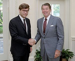 Ronald Reagan and William Barr (cropped)