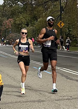 Shalane Flanagan and Matt James at Mile 24 of the 2023 New York City Marathon