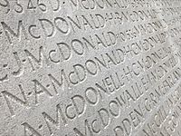 names inscribed on outside wall of Vimy monument more clearly visible after restoration