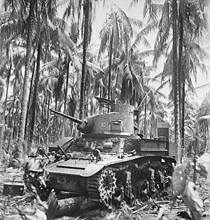 013932 Bellied M3 tank at Buna