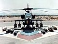 Ah-64 ground with weapons (cropped)