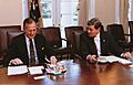 Senator Kit Bond joins President George H. W. Bush in the White House conference room