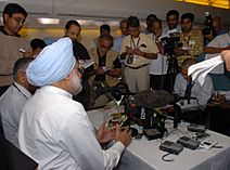 The Prime Minister, Dr. Manmohan Singh briefing the media, on board Air India One, on his way back to India on September 17, 2006