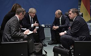 Vladimir Putin and Boris Johnson at Libya Conference