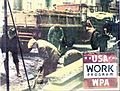 Workers digging in a street with their shovels; a red truck is seen in the background and "USA Work Program WPA" is spelled out in the lower right. 