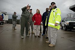 Congresswoman Shelley Moore Capito, in red, meets with U.S. Air Force Col. Jerome Gouhin, left, the commander of the 130th Airlift Wing, West Virginia Air National Guard, at a Federal Emergency Management Agency 140111-Z-HL234-002