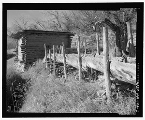 LA CANOA ELEVADA- Trough of hollowed log, elevated on log structure. - La Cienega Acequia, Truchas Molino, 334 Los Pinos Road, Santa Fe, Santa Fe County, NM HAER NM-14-A-1