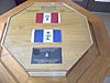 Officer Cadet's Le Saint-Maurice mess tables commemorate old & new Coat of Arms of RMC Saint-Jean