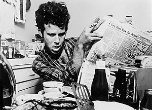 Tom Waits (1979–80 publicity photo in kitchen by Greg Gorman)