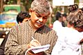 Anisul Hoque at Borno Mela giving autograph