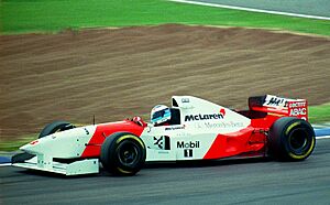 Mika Hakkinen - Mclaren MP4-10B at the 1995 British Grand Prix, Silverstone (49720823936).jpg