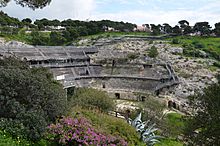 Roman amphitheatre, half carved in the rock in the 2nd century AD, Caralis (Cagliari), Sardinia (16558175351)