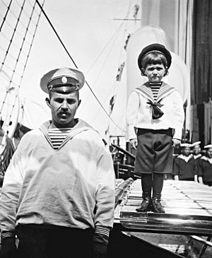 Tsesarevich Alexei (right) with his sailor nanny Andrei Dereven'ko aboard the Imperial yacht Standart on June 1908