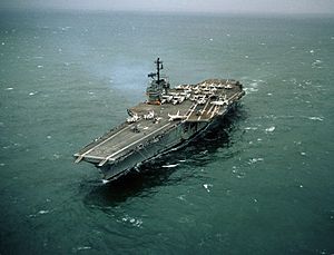 US Navy 330-CFD-DN-SC-04-09140 Aerial port bow view of USS Forrestal (CVA-59) underway August 1967 a month after fires