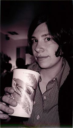 Carrie Brownstein with a paper cup