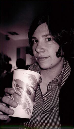 Carrie Brownstein with a paper cup