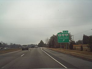 Northbound Interstate 95 approaching the exit for Templeton. Courtland is located southeast of this view along VA 35.