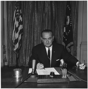 President Lyndon B. Johnson signs "Gulf of Tonkin" resolution - NARA - 192484