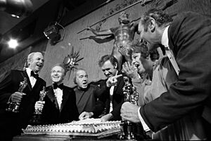 Actors on the set of The Poseidon Adventure celebrating their Oscar wins