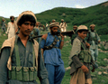Afghan Muja crossing from Saohol Sar pass in Durand border region of Pakistan, August 1985