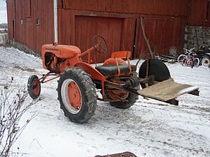 Allis-Chalmers Model B with a buzz saw