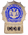 Badge of a New York City Police Department detective.png