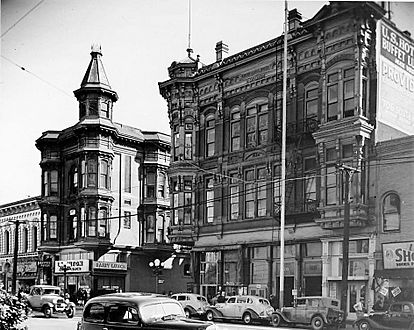 East side of Main at Requena, United States Hotel at right, 200–202 N. Main at left