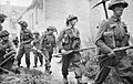 Infantry of 6th Royal Scots Fusiliers, 15th (Scottish) Division in the village of St Mauvieu-Norrey in Normandy, during Operation 'Epsom', 26 June 1944. B5968