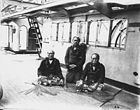 Lauaki Namulau'ulu Mamoe (left) and two chiefs aboard German warship taking them to exile in Saipan 1909