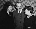 Lise Meitner standing at meeting with Arthur H. Compton and Katherine Cornell