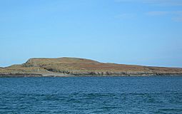 Nave Island from Ardnave Point with the ruined chapel just visible at left